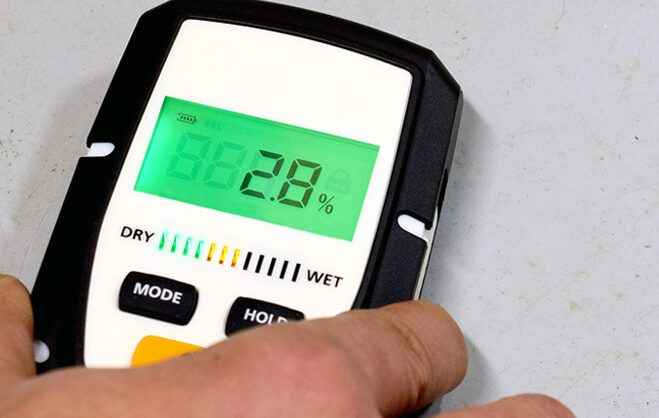moisture testing tool on concrete floor